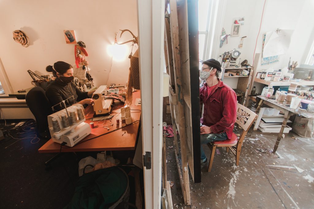 Artists working in an art studio